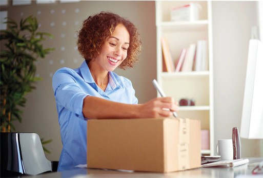 Woman smiling at package