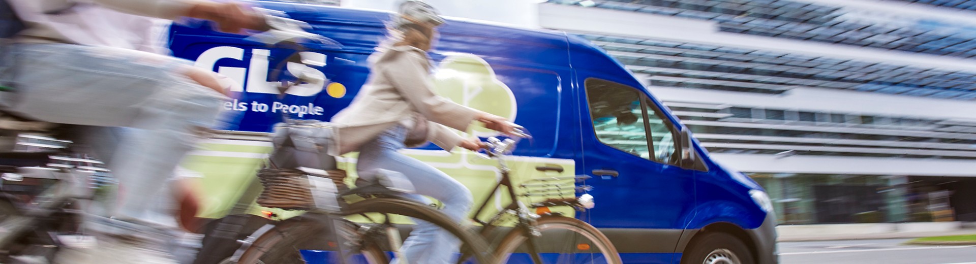 GLS delivery van driving through the city