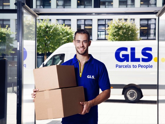 GLS courier delivers package.