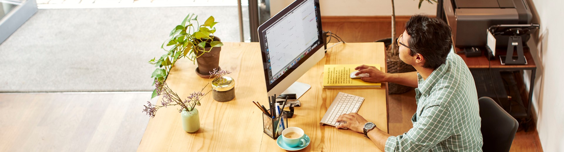 man in the office in front of computer 