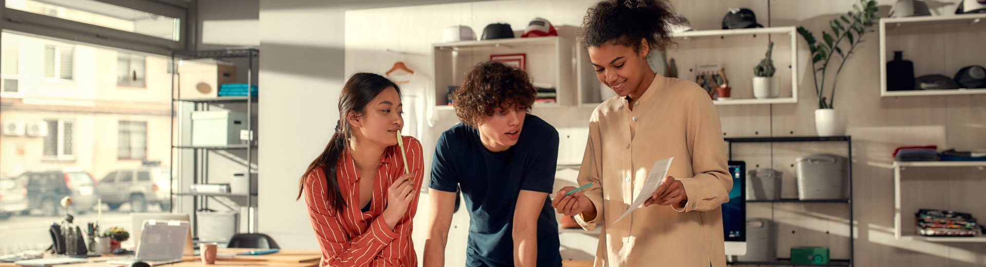 3 young employees working together on a project 