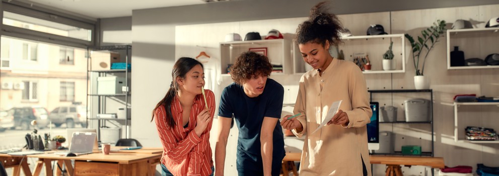 3 young employees working together on a project 